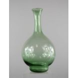 A Victorian hand blown green glass bottle neck vase, 36cm high.