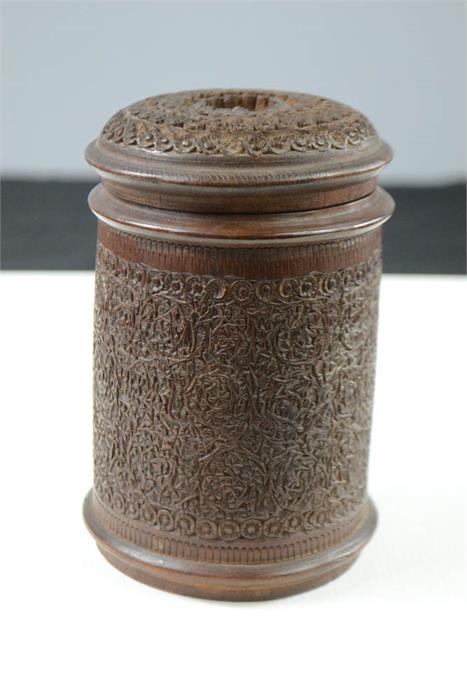 A treen carved box, circa 1900.