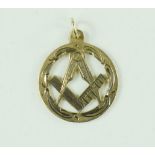 A 9ct gold Masons pendant.