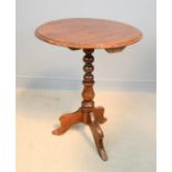 A circular top occasional table.