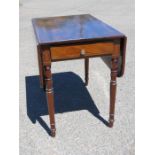 A 19th century mahogany inlaid pembroke table, with single drawer and drop leaves, raised on