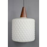 A Swedish teak and opaque satin glass pendant light.