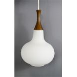 A Swedish teak and opaque satin glass pendant light.