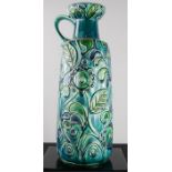 Bay West German pottery jug, raised floral pattern, turquoise and blue glaze, no 73 45, 46cm high.