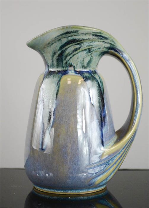 A 1960s lustre glazed pottery jug, 19cm high.