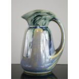 A 1960s lustre glazed pottery jug, 19cm high.