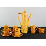 A Portmerion Totem Susan Williams-Ellis coffee set in orange.