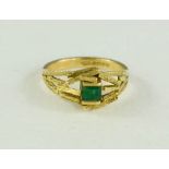 An 18ct gold and emerald ring, of contemporary design, makers initials TAP, 5.6g.