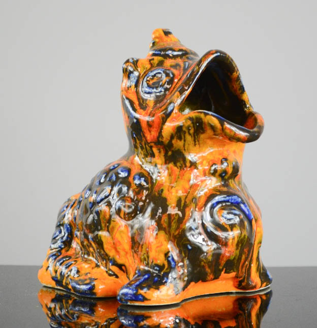 Jasba pottery frog figure, no 506013, orange mottled glaze, 14cm high.