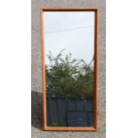 A Danish teak mirror by Kai Kristiansen for Akel Kjersgaard, 105 by 41cm