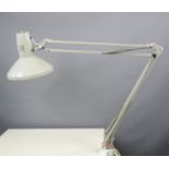 A clamp anglepoise lamp in light grey.