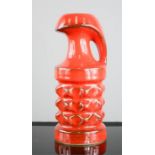 A 1960s West German pottery vase, in the form of a grenade, in red, 20cm high.