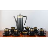 A Portmerion coffee set, black and gold designed by Susan Williams-Ellis.