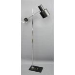 A Swedish chromed steel and black metal shade angled floor lamp.