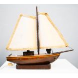 A 1950s boat form treen lamp.