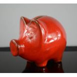 West German pottery pig money box with red glaze, no. 791, circa 1960, 11 cm high.