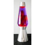 A large lava lamp, in pink.