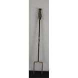 A cast iron toasting fork.