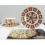 A Royal Crown Derby cup and saucer; Imari pattern 1128, together with a plate of the same; 16cm