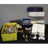 A group of cutlery including boxed Mappin & Webb, some silver plated, napkin rings, and others.