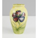 A Moorcroft bud vase. 10cm high.