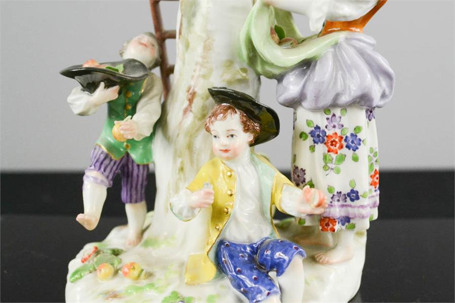 A Meissen 20th century figure group of young children playing in an apple tree, blue crossed sword - Image 4 of 6