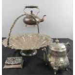 A large silver plated bowl, tea pot and jug.