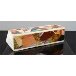 A pietra dura specimen marble paperweight, Grand Tour style sienna marble.26 by 6cm.