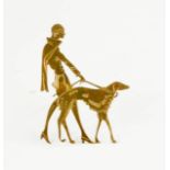 Canine Interest: Unusual Art Deco Brass Brooch, modelled as a fashionable lady in a cape walking her