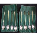 A set of eight ivory and silver spoons circa 1910.