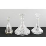 A cut crystal decanter French Cristal decanter and a small hand decorated decanter. (3)