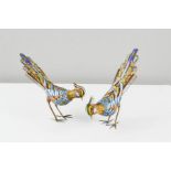 A pair of silver gilt filagree and enamel peacock marked 925 silver. 12cm high.
