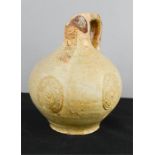 A 17th century bellarmine jug, 19cm high. [Reputedly dredged from the sea off Great Yarmouth in