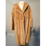 A mink full length coat.