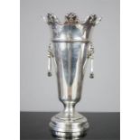 An ornamental silver vase with lions head handles, hallmarked Sheffield 1926, 9.5toz.
