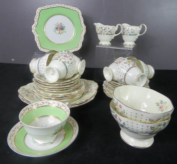 A group of Foley gilt and floral bordered teaware.