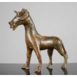 An early naive bronze African goat, 14cm high.