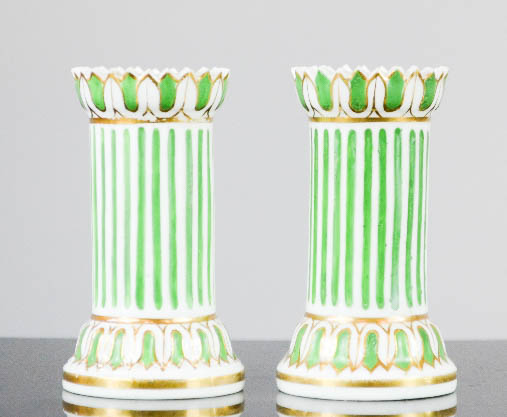 A pair of Regency porcelain candlesticks.