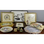 A group of bicycle related ephemera to include two prints, tea towels, board game, ceramics etc.