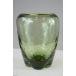 A 1950s Whitefriars vase formed on three feet, meadow green inclusion with bubble design, 20cm