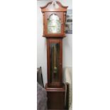 A reproduction mahogany longcase clock.