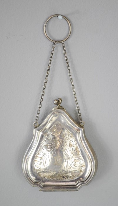 A lady's silver hinged purse with leather interior, foliate engraved, Birmingham 1917, 2toz.