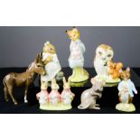 A group of Beswick beatrix potter and other figures.