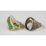 A silver gilt ring, and a further dress ring.