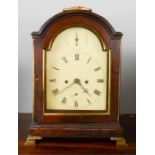 A 19th century mahogany bracket clock, with dome top and glass door, Roman Numeral dial, Strike
