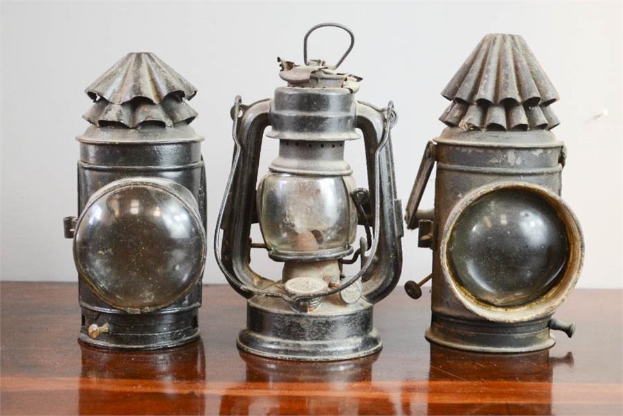 Two antique lamps with convex lenses, together with a Fenerland Superbaby German Lamp no 175 circa