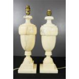 A pair of alabaster lamp bases, classical urn form.