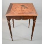 An Indian rosewood table, with marquetry inlaid top.