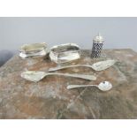 Two silver salts, indistinctly hallmarked, silver spoon, two silver tea spoons, a silver plated salt