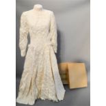 A wedding dress, in a JAS Smiths & Sons box.